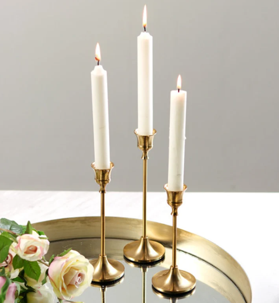 simple gold taper candle holder