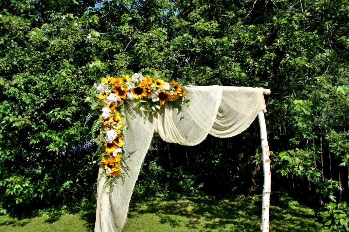 photo of sunflower ceremony arch